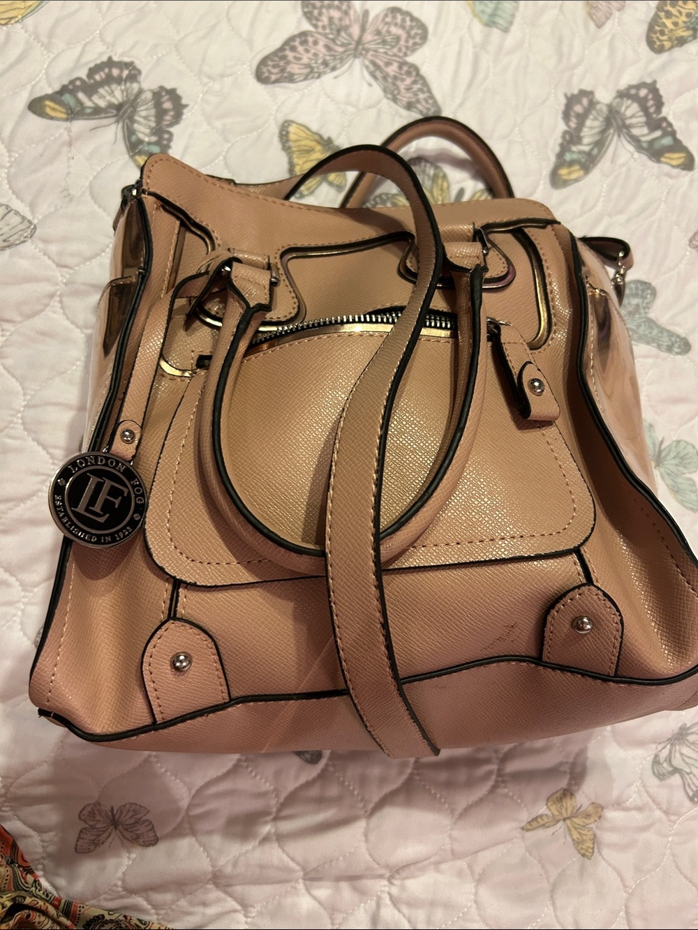 London Fog shoulder bag. Black trip.  Casual bag and ready to dress up.